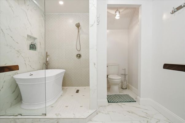 Bathroom, Free Standing Baths, Glass Shower, Interior, Marble, Marble Walls, Recessed Lighting