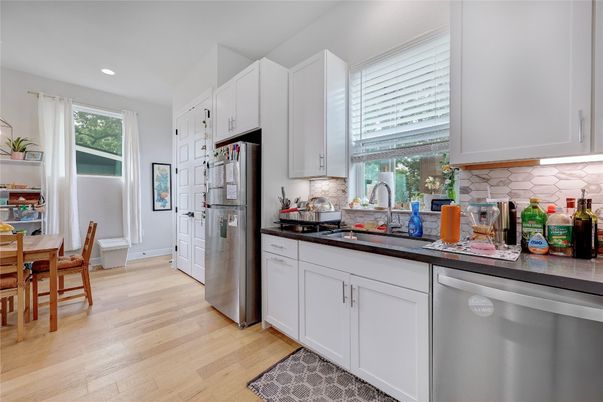 Dining room, Interior, Kitchen, Recessed Lighting, Stainless Steel Appliances, Wood Texture Flooring
