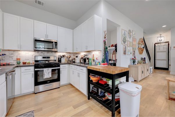 Interior, Kitchen, Recessed Lighting, Stainless Steel Appliances, Wood Texture Flooring