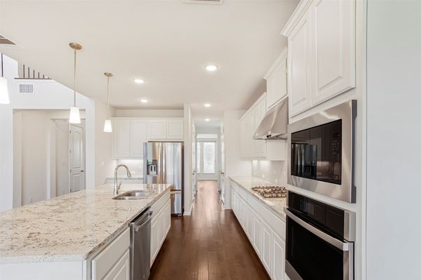 Interior, Kitchen, Pendant Lights, Recessed Lighting, Stainless Steel Appliances, Wood Texture Flooring