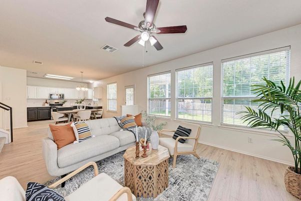 Chandelier, Dining room, Interior, Kitchen, Living room, Pendant Lights, Stainless Steel Appliances, Wood Texture Flooring