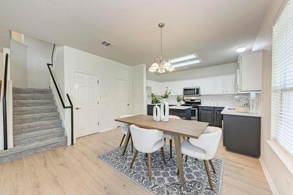 Dining room, Interior, Kitchen, Pendant Lights, Stainless Steel Appliances, Wood Texture Flooring