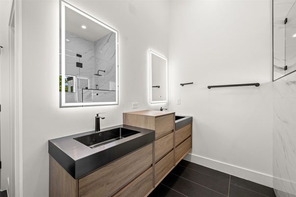 Bathroom, Dual Sink Vanities, Interior, Marble Walls, Recessed Lighting
