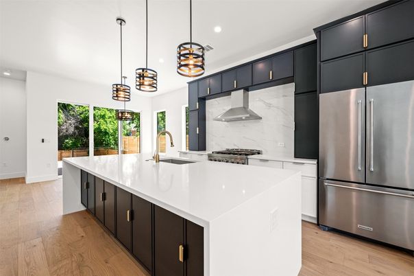 Interior, Kitchen, Marble Walls, Pendant Lights, Recessed Lighting, Stainless Steel Appliances, Wood Texture Flooring