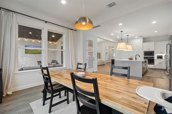 Dining room, Interior, Kitchen, Pendant Lights, Recessed Lighting, Stainless Steel Appliances, Wood Texture Flooring