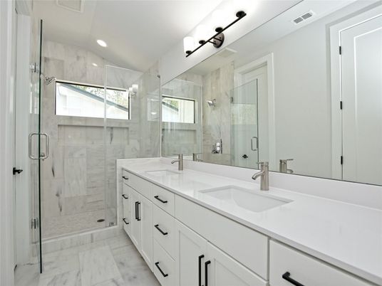Bathroom, Dual Sink Vanities, Glass Shower, Interior, Marble, Marble Walls, Recessed Lighting