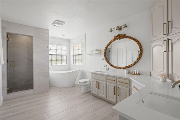 Bathroom, Dual Sink Vanities, Free Standing Baths, Glass Shower, Interior, Marble Walls, Wood Texture Flooring