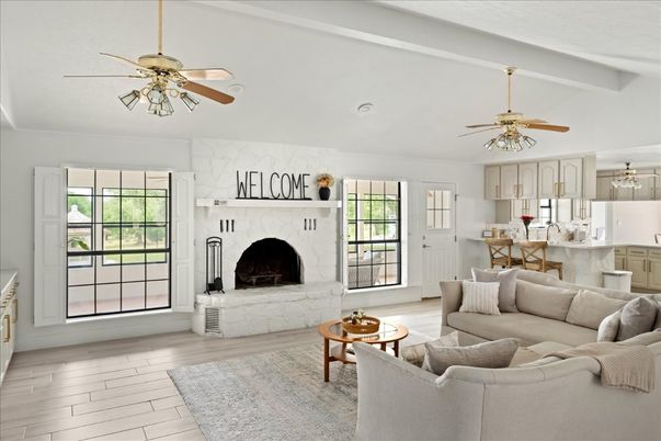 Dining room, Fireplace, Interior, Living room, Recessed Lighting, Wood Texture Flooring