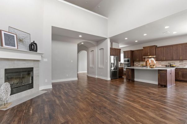 Fireplace, Interior, Kitchen, Recessed Lighting, Stainless Steel Appliances, Wood Texture Flooring
