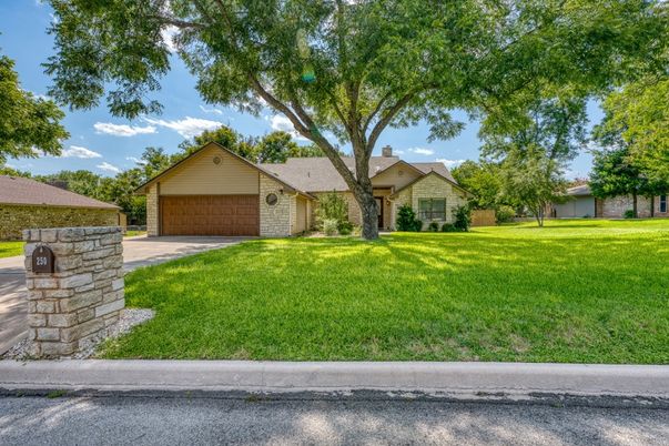 Attached, Backyard, Exterior, Facade, Brick Facade, Ranch
