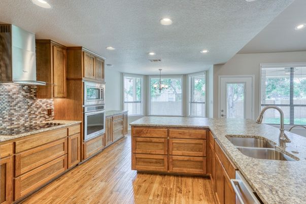 Chandelier, Interior, Kitchen, Recessed Lighting, Stainless Steel Appliances, Wood Texture Flooring