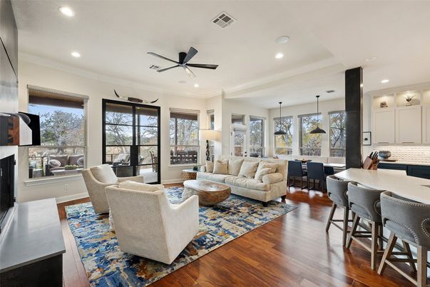 Dining room, Fireplace, Interior, Living room, Pendant Lights, Recessed Lighting, Wood Texture Flooring