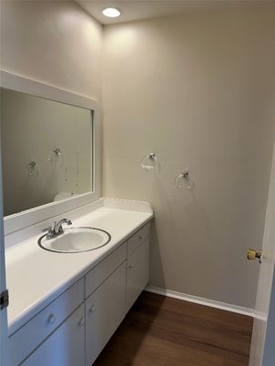 Bathroom, Dual Sink Vanities, Interior, Recessed Lighting, Wood Texture Flooring