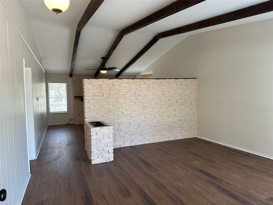 Empty room, Fireplace, Interior, Stone Walls, Wooden Beams, Wood Texture Flooring