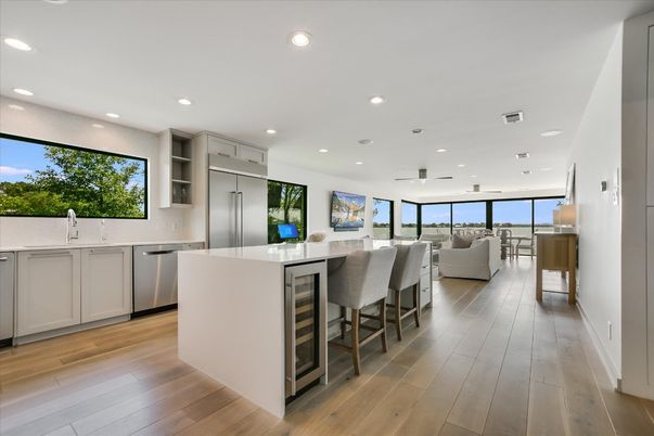 Dining room, Interior, Kitchen, Living room, Recessed Lighting, Stainless Steel Appliances, Wood Texture Flooring
