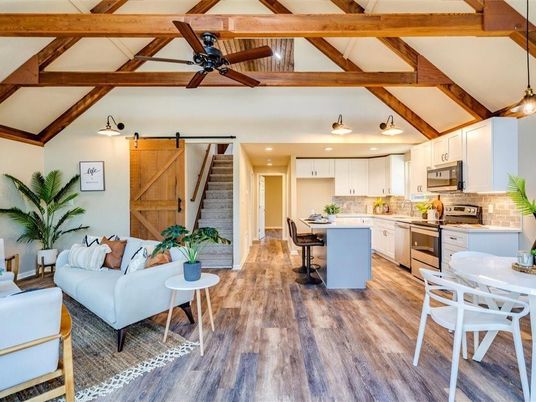 Dining room, Interior, Kitchen, Living room, Pendant Lights, Recessed Lighting, Stainless Steel Appliances, Wooden Beams, Wood Texture Flooring
