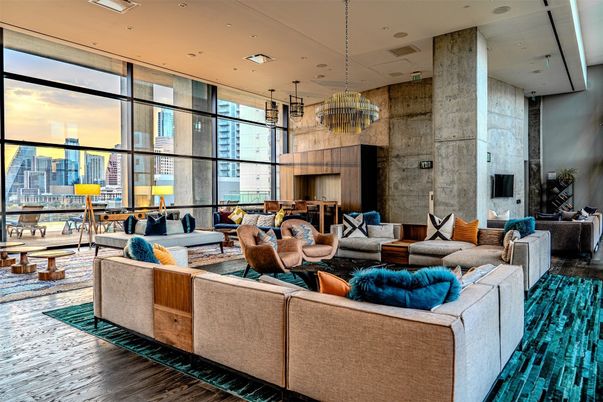 Chandelier, Dining room, Interior, Living room, Pendant Lights, Recessed Lighting, Stone Walls, Wood Texture Flooring