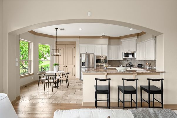 Chandelier, Dining room, Interior, Kitchen, Pendant Lights, Recessed Lighting, Stainless Steel Appliances, Wood Texture Flooring