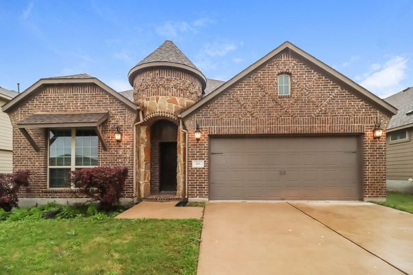 Attached, Exterior, Facade, Brick Facade, Brick Traditional