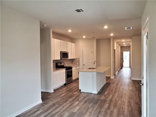 Interior, Kitchen, Recessed Lighting, Stainless Steel Appliances, Wood Texture Flooring
