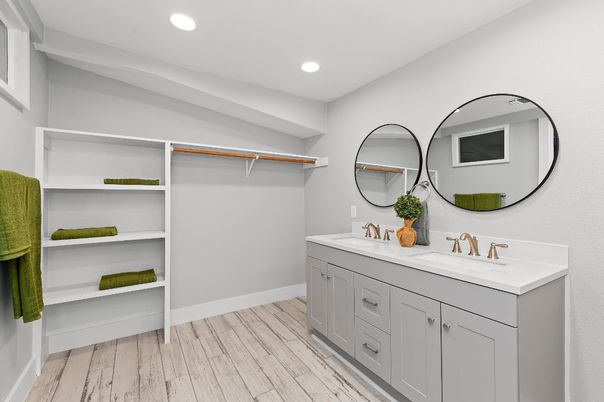 Bathroom, Dual Sink Vanities, Interior, Recessed Lighting, Walk-in Closets, Wood Texture Flooring