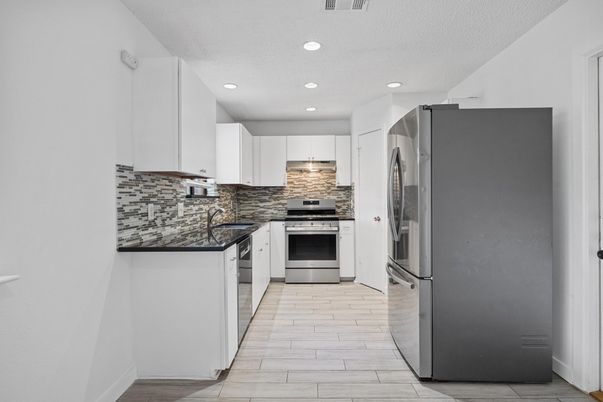 Interior, Kitchen, Recessed Lighting, Stainless Steel Appliances, Wood Texture Flooring