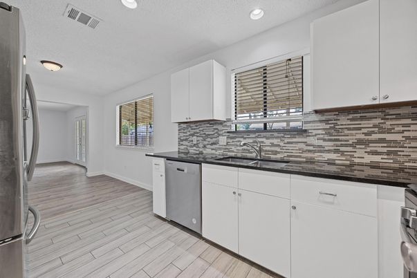 Interior, Kitchen, Recessed Lighting, Stainless Steel Appliances, Wood Texture Flooring