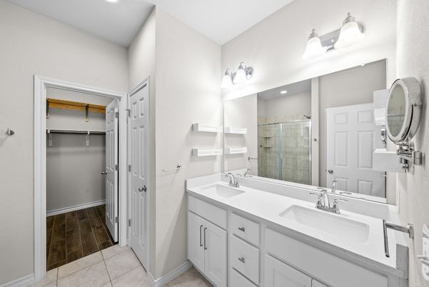 Bathroom, Dual Sink Vanities, Glass Shower, Interior, Recessed Lighting, Wood Texture Flooring