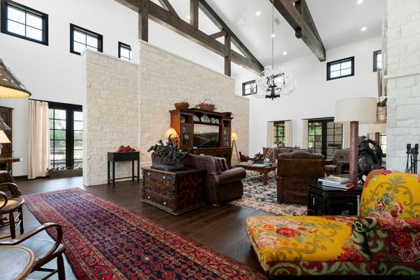 Chandelier, Fireplace, Interior, Living room, Recessed Lighting, Stone Walls, Wooden Beams, Wood Texture Flooring