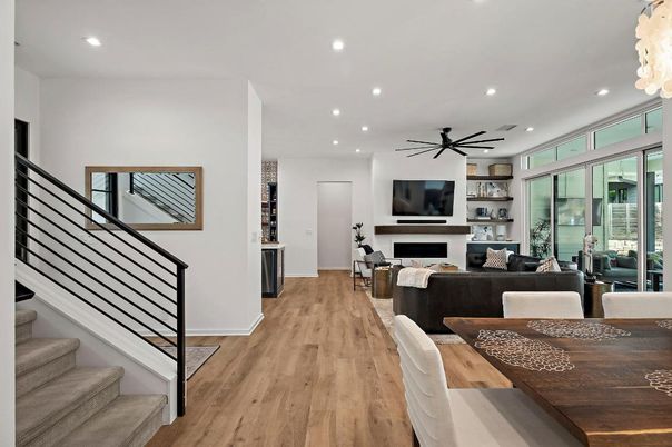 Dining room, Fireplace, Interior, Living room, Pendant Lights, Recessed Lighting, Wood Texture Flooring