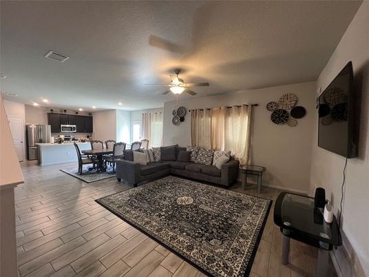 Dining room, Interior, Kitchen, Living room, Recessed Lighting, Stainless Steel Appliances, Wood Texture Flooring