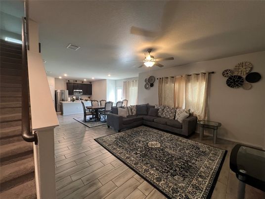 Dining room, Interior, Kitchen, Living room, Recessed Lighting, Stainless Steel Appliances, Wood Texture Flooring