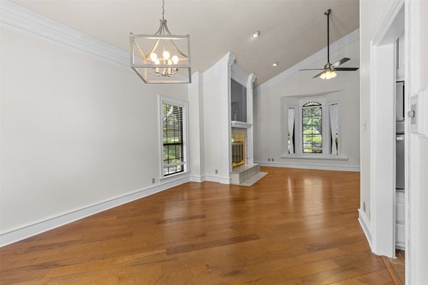 Empty room, Fireplace, Interior, Pendant Lights, Recessed Lighting, Wood Texture Flooring