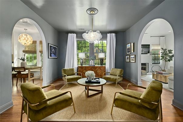 Chandelier, Dining room, Fireplace, Interior, Living room, Pendant Lights, Recessed Lighting, Wood Texture Flooring