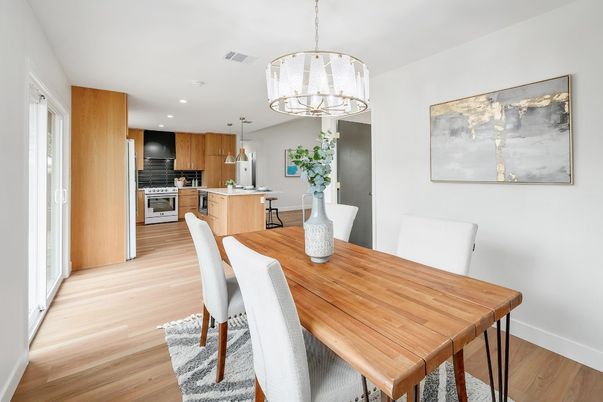 Chandelier, Dining room, Interior, Kitchen, Pendant Lights, Recessed Lighting, Stainless Steel Appliances, Wood Texture Flooring
