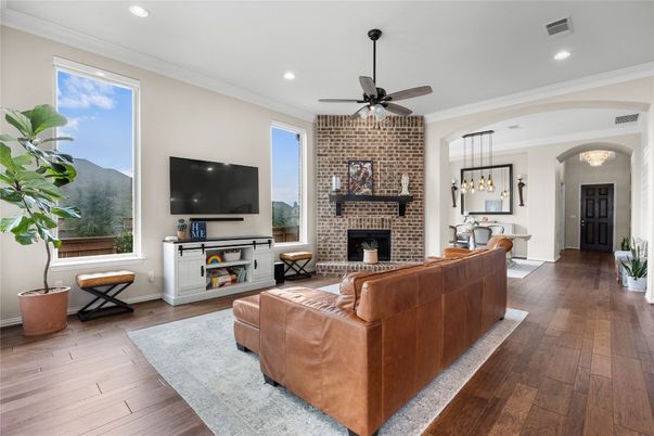 Dining room, Fireplace, Interior, Living room, Pendant Lights, Recessed Lighting, Stone Walls, Wood Texture Flooring