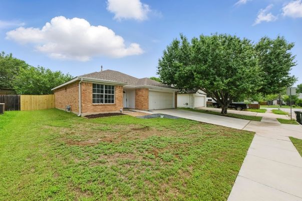 Attached, Backyard, Exterior, Facade, Brick Facade, Ranch