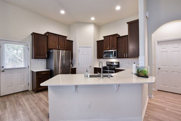 Interior, Kitchen, Recessed Lighting, Stainless Steel Appliances, Wood Texture Flooring