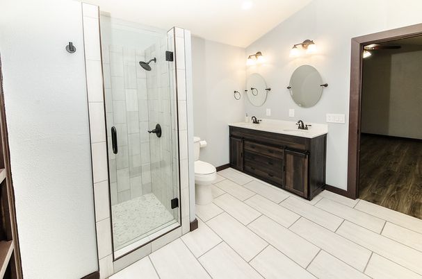 Bathroom, Dual Sink Vanities, Glass Shower, Interior, Wood Texture Flooring