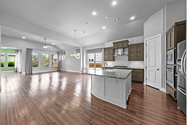 Chandelier, Empty room, Interior, Kitchen, Pendant Lights, Recessed Lighting, Stainless Steel Appliances, Wood Texture Flooring