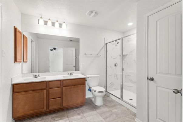 Bathroom, Dual Sink Vanities, Glass Shower, Interior, Marble Walls, Recessed Lighting