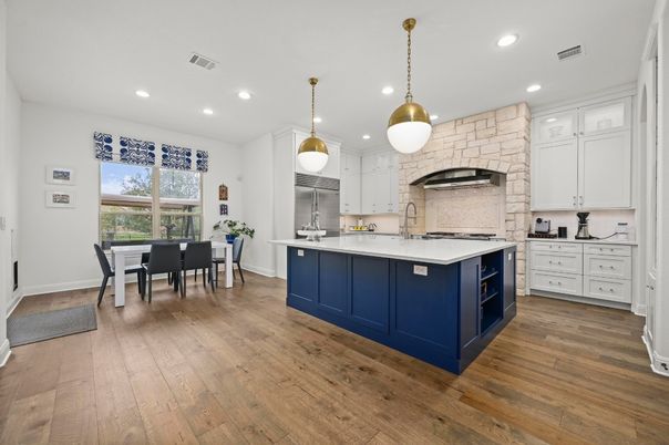 Dining room, Interior, Kitchen, Pendant Lights, Recessed Lighting, Stainless Steel Appliances, Stone Walls, Wood Texture Flooring