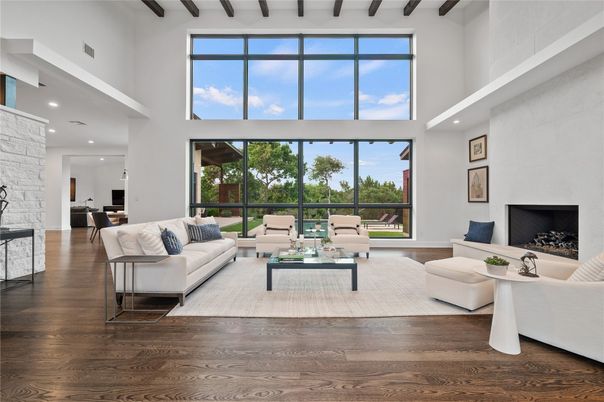 Fireplace, Interior, Living room, Recessed Lighting, Stone Walls, Wood Texture Flooring