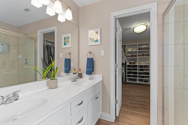 Bathroom, Dual Sink Vanities, Glass Shower, Interior, Walk-in Closets, Wood Texture Flooring
