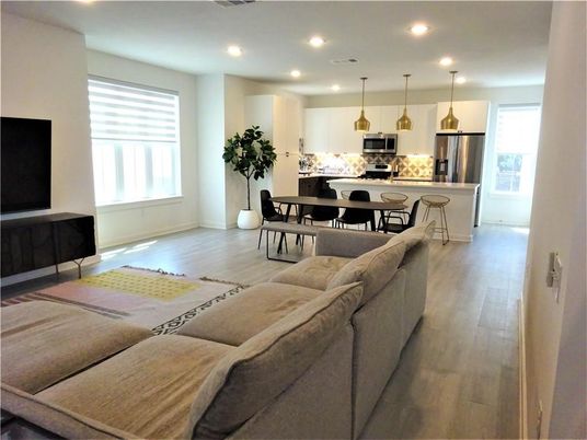 Dining room, Interior, Kitchen, Living room, Pendant Lights, Recessed Lighting, Stainless Steel Appliances, Wood Texture Flooring