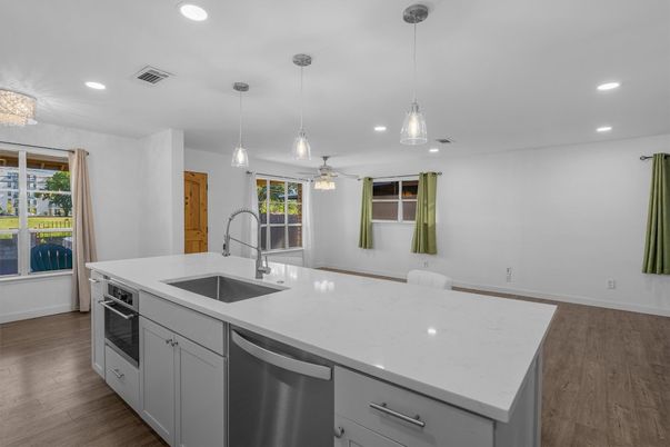 Interior, Kitchen, Pendant Lights, Recessed Lighting, Stainless Steel Appliances, Wood Texture Flooring
