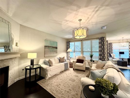 Dining room, Fireplace, Interior, Living room, Pendant Lights, Water, Wood Texture Flooring