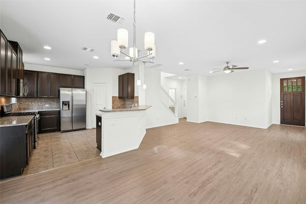 Chandelier, Interior, Kitchen, Pendant Lights, Recessed Lighting, Stainless Steel Appliances, Wood Texture Flooring