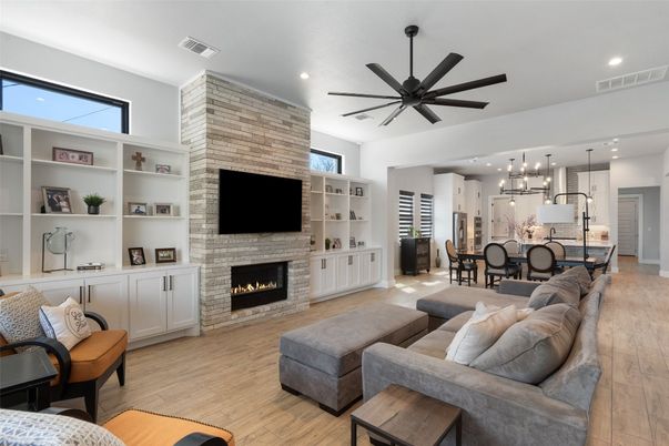 Dining room, Fireplace, Interior, Kitchen, Living room, Pendant Lights, Recessed Lighting, Stainless Steel Appliances, Stone Walls, Wood Texture Flooring