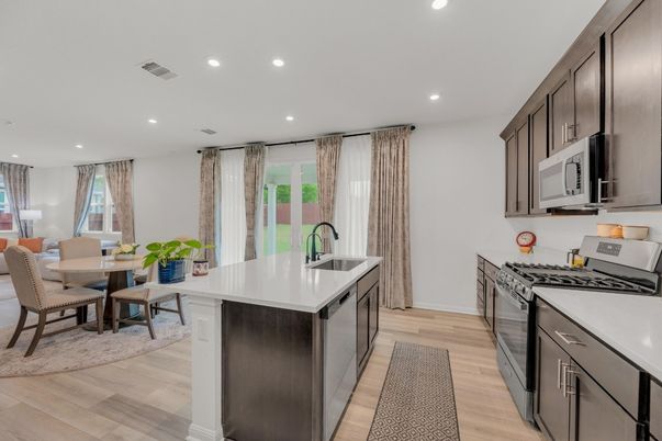 Dining room, Interior, Kitchen, Recessed Lighting, Stainless Steel Appliances, Wood Texture Flooring